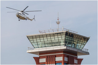 KPAAF Mil-17 flies past the tower at Kalma