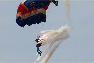 Parachutist with fireworks