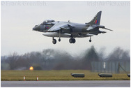 RAF Cottesmore - Group Captain Gary Waterfall OBE Joint Force Harrier Commander and Cottesmore Station Commander performs the Harriers last ever landing in RAF Service
